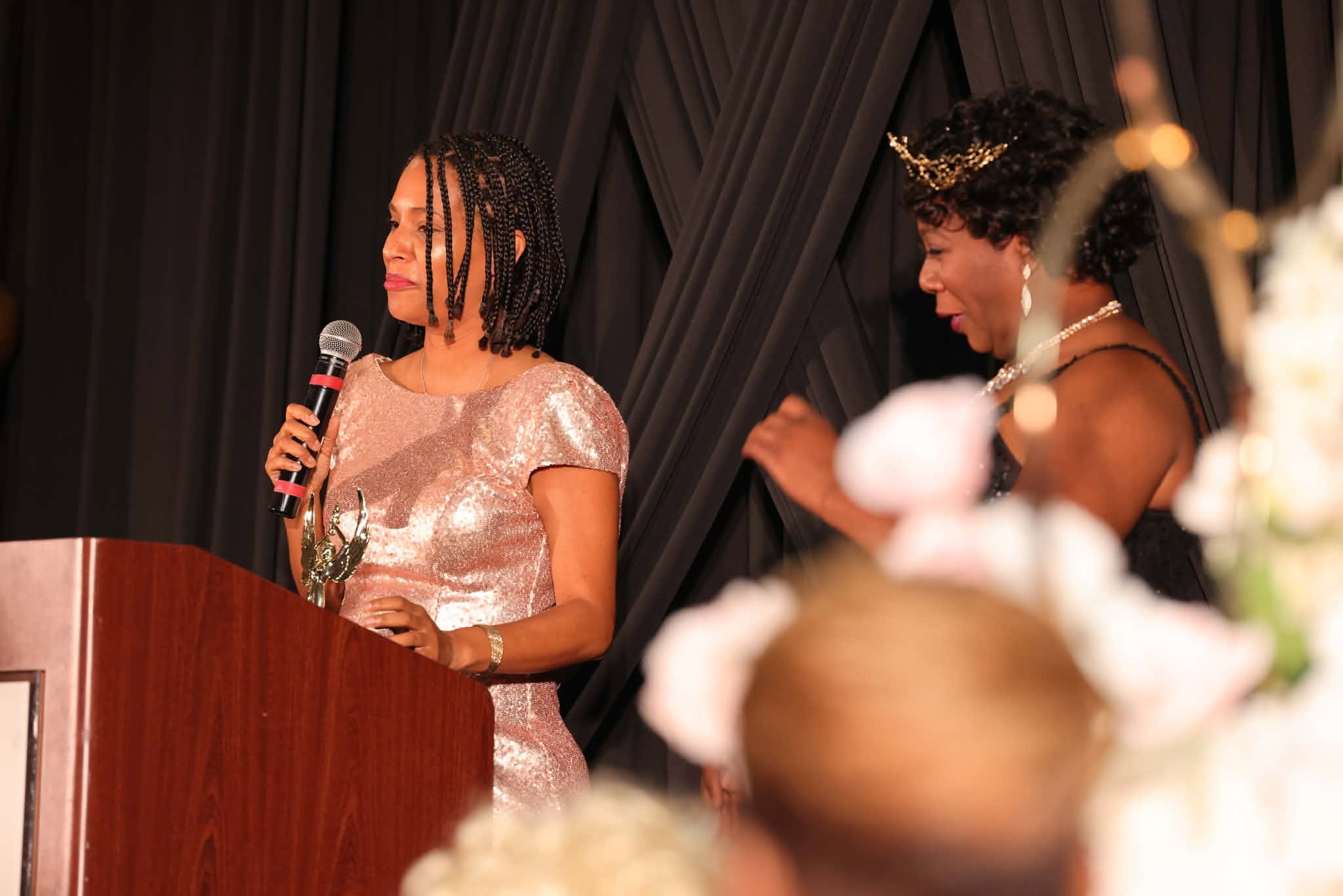 Honoree Accepting Award at the Podium