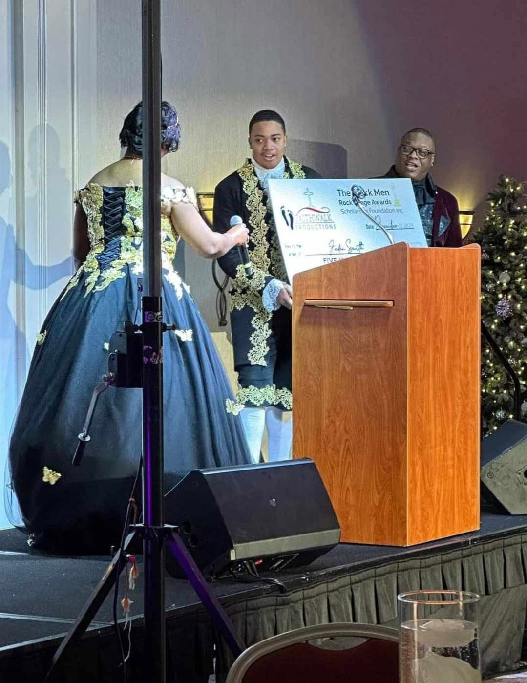 Scholarship Check Presentation on Stage — 2023 Black Men Rock