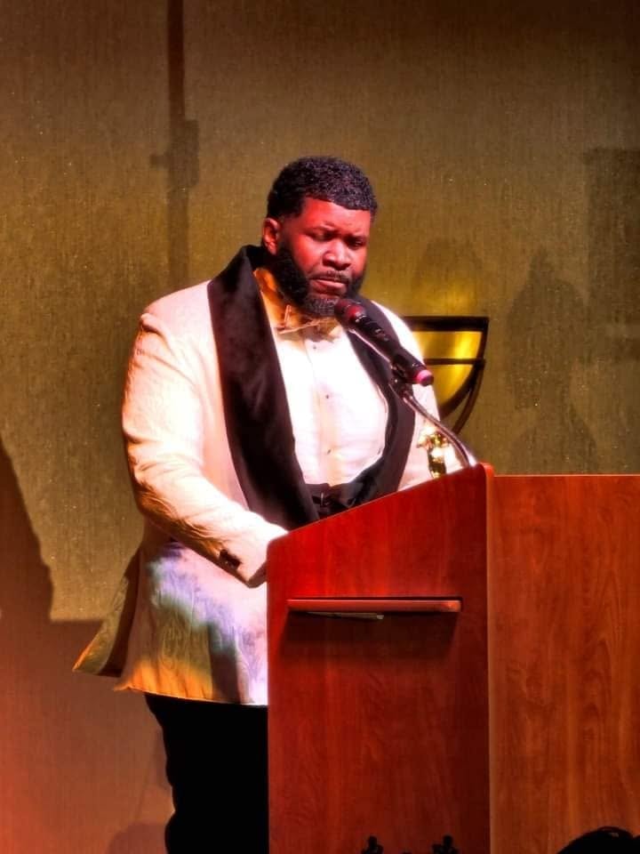 Speaker at the Podium — 2023 Black Men Rock Scholarship Ball