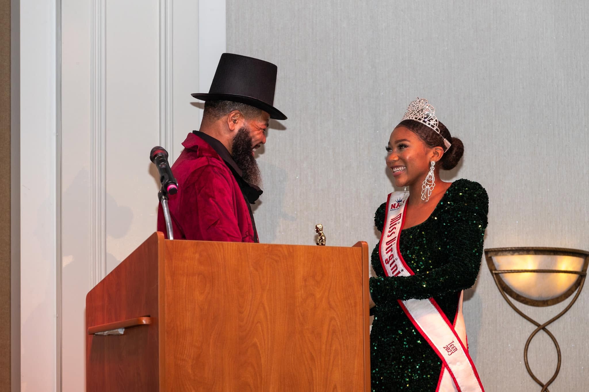 Emcee in Top Hat with Miss Virginia at the Podium