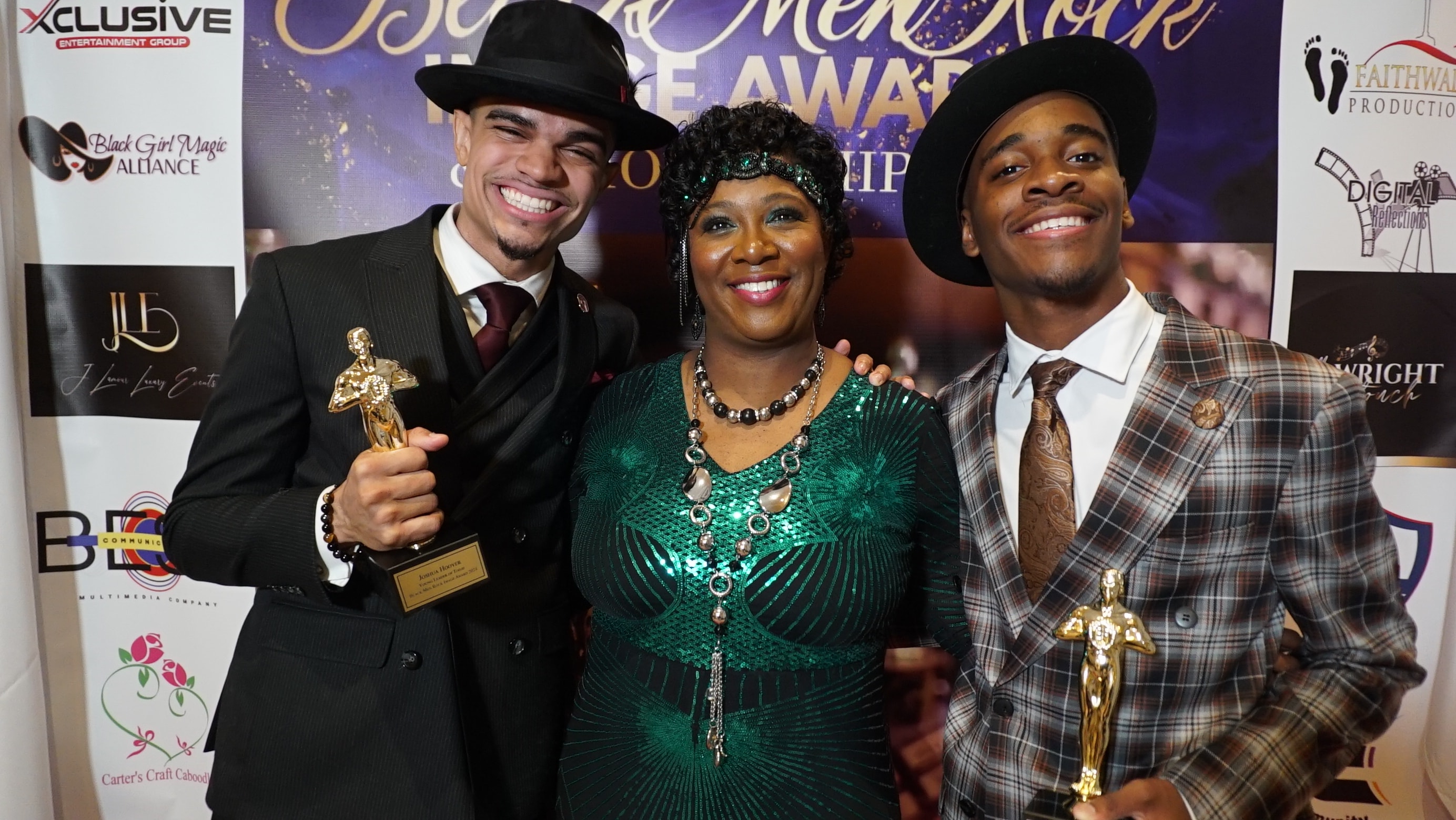 Honorees Posing with Awards at the Step-and-Repeat