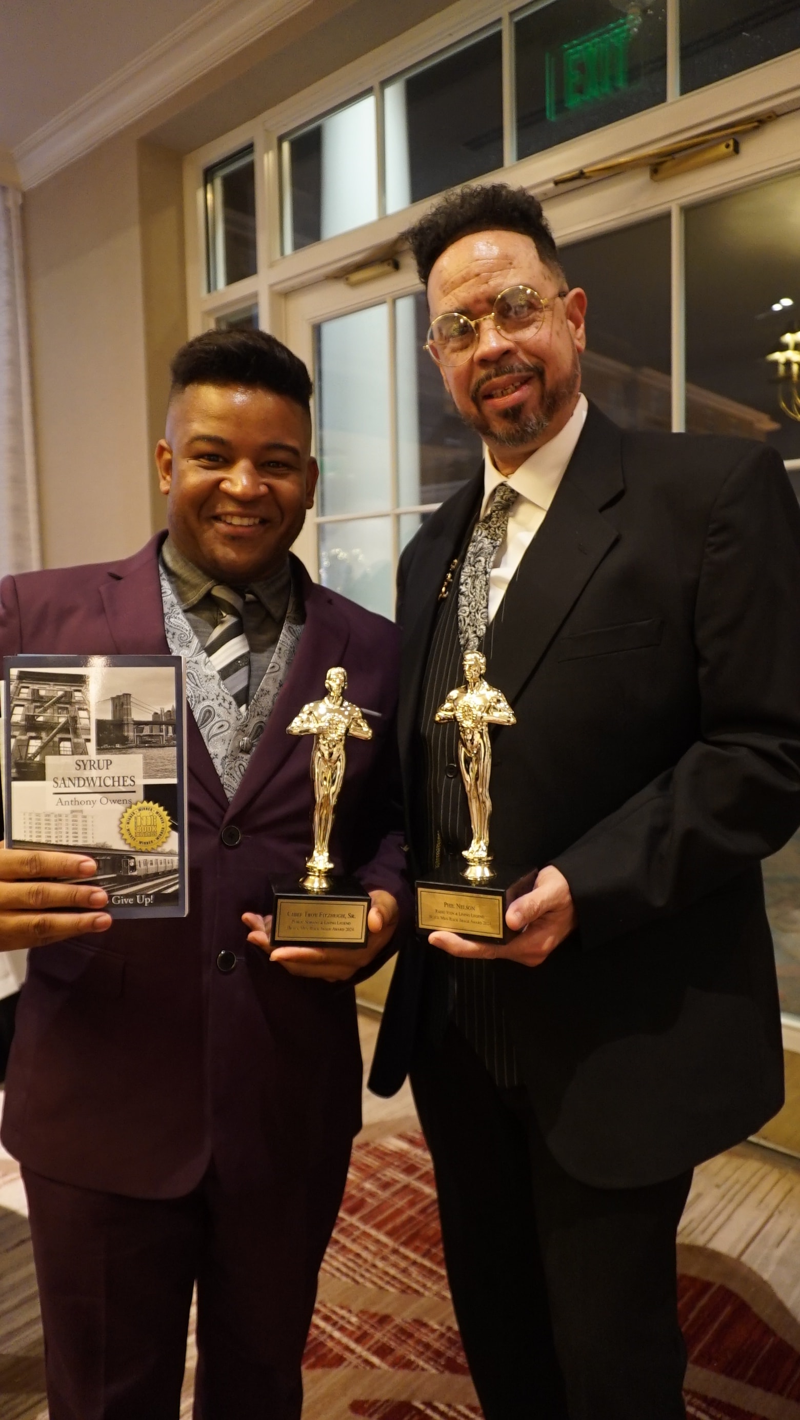 Two Honorees with Their Awards